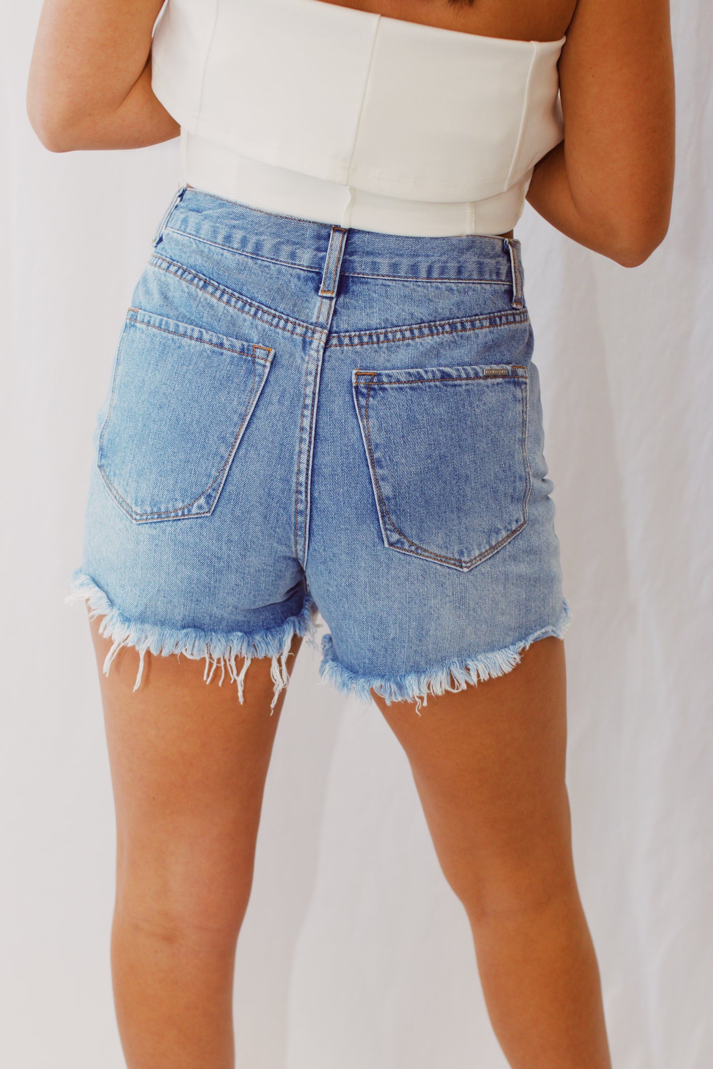 Don't Get It Twisted Crossover Denim Shorts