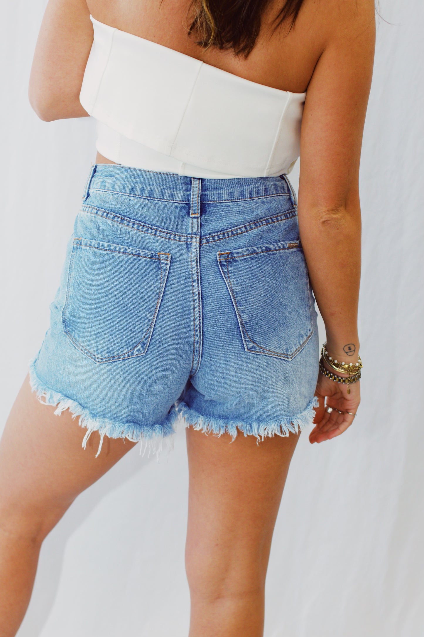 Don't Get It Twisted Crossover Denim Shorts